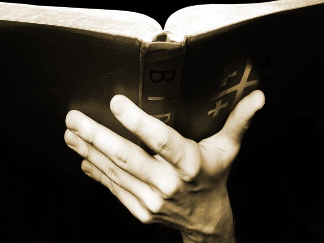 bible in hand